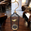 SPARROW IN CAGE